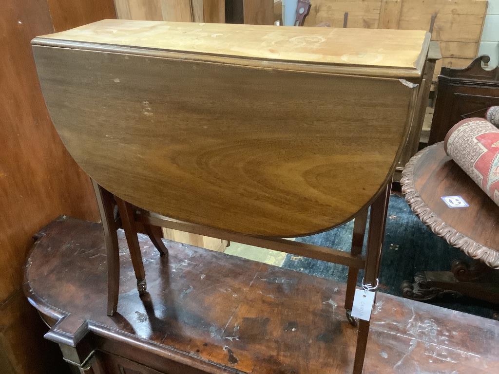 An Edwardian mahogany Sutherland table